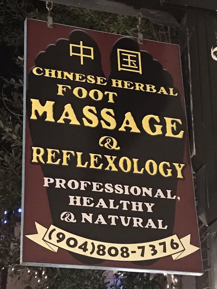 Our hanging sign: Chinese herbal foot massage and reflexology, phone (904) 808-7376