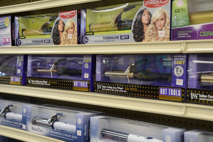 Professional curling irons and styling tools on our shelves