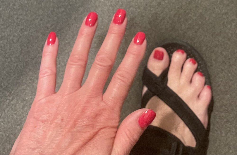 Our glossy red manicure and matching pedicure