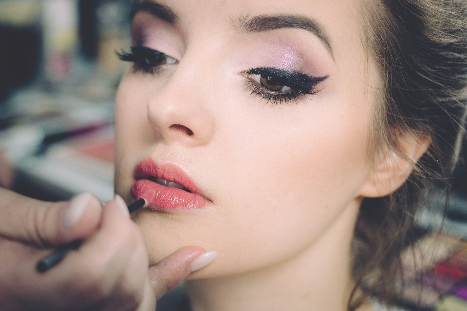 Close work on lips and lashes at the chair