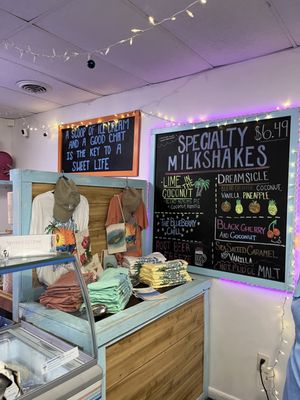 Specialty milkshakes chalkboard and merch