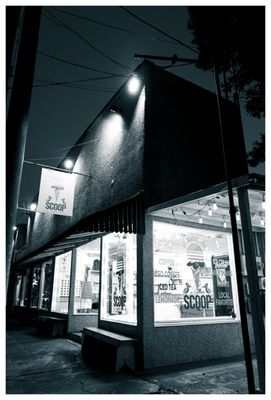 Our storefront at night with the Scoop cone in the window