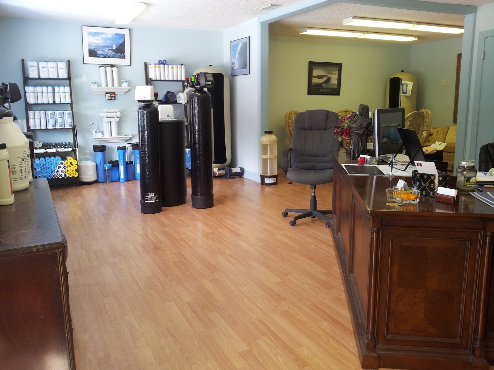 Our showroom with filter cartridges, RO housings, and tanks