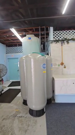 Our filtration tanks on the shop floor under the rafters