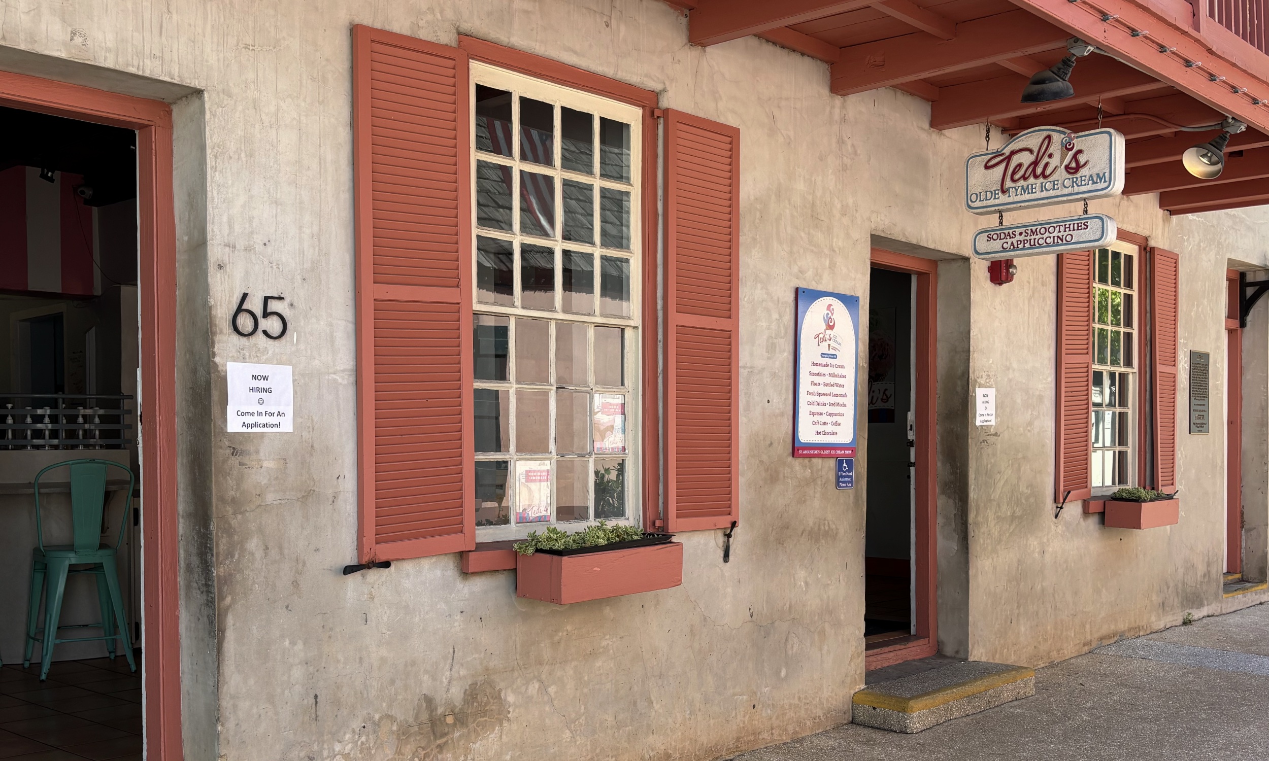 Our door and the hanging sign at 65 St. George