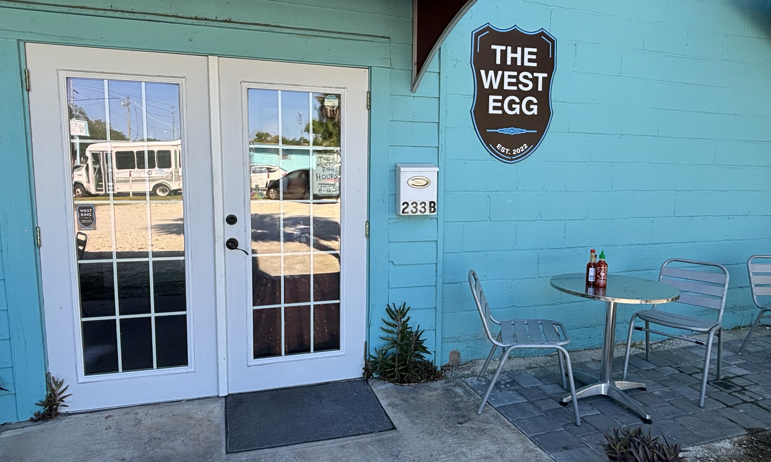 Our door and the seats out front on West King