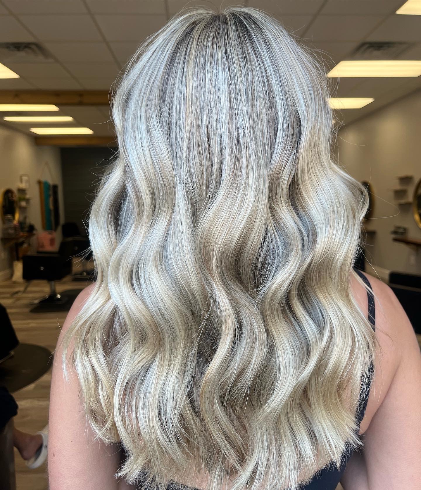 Long cool blonde waves we finished in the salon.