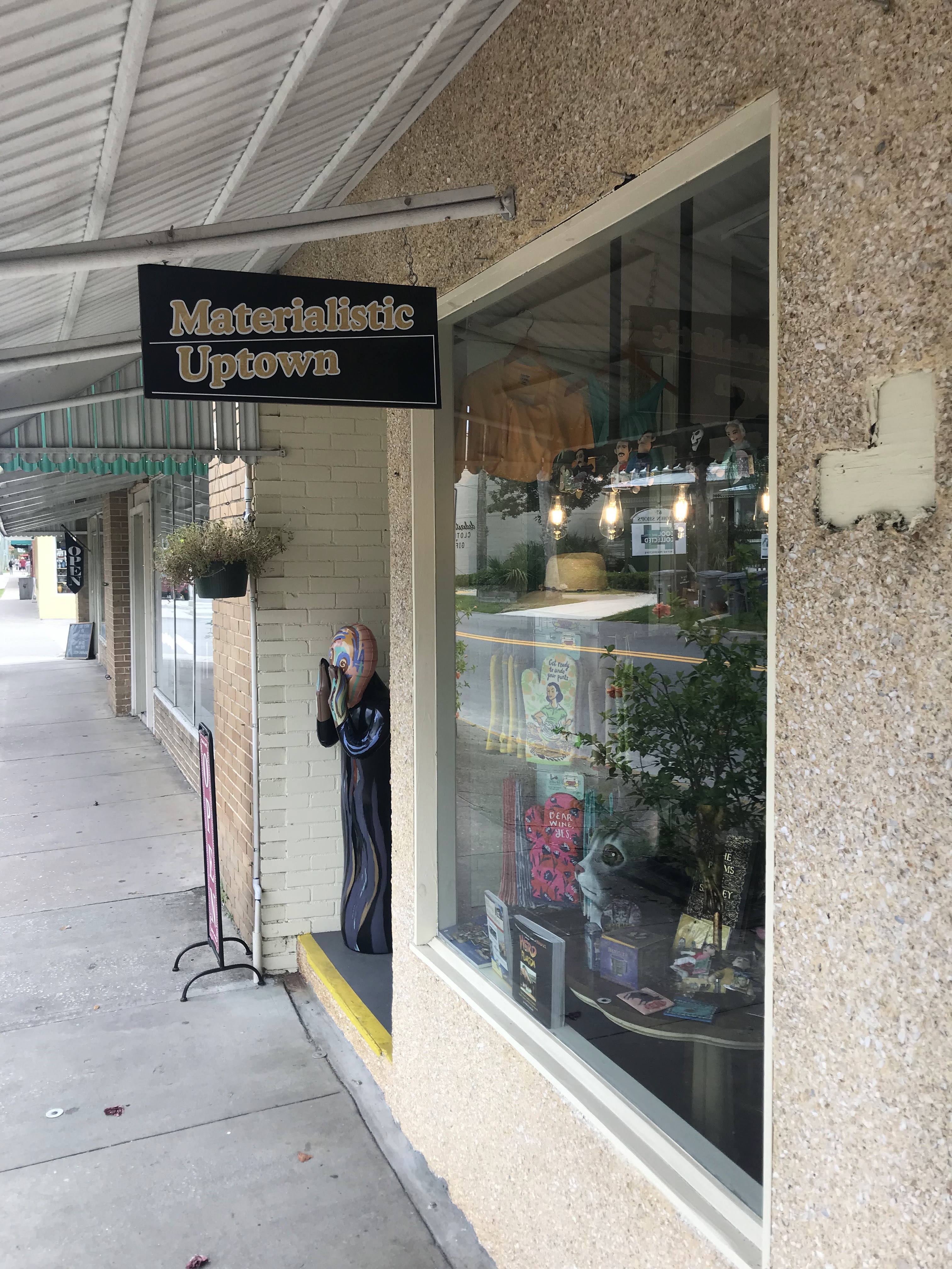 The window: shirts, books, and the doorway on San Marco.