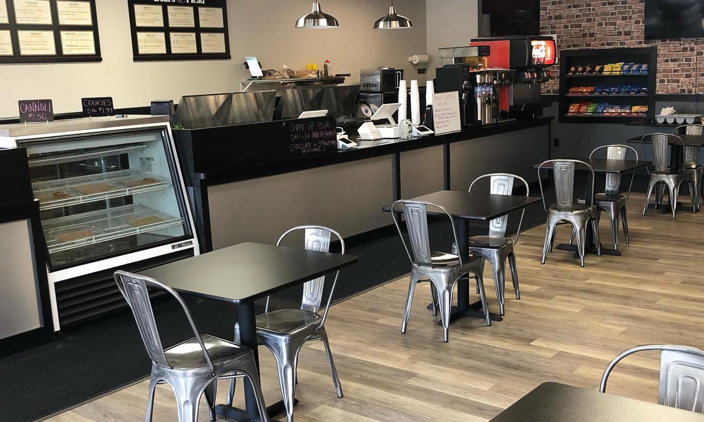 Our lunch counter, menu board, and red stools.