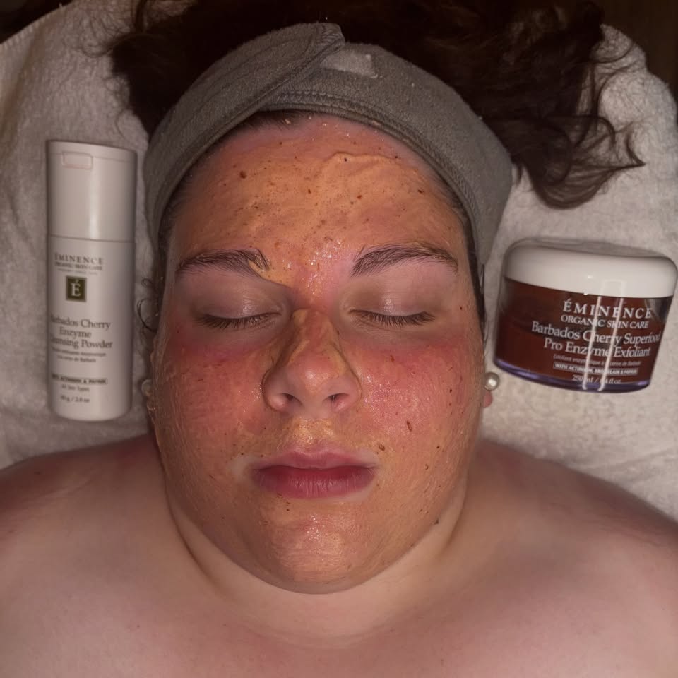 A facial in progress with organic enzyme products on the towel.