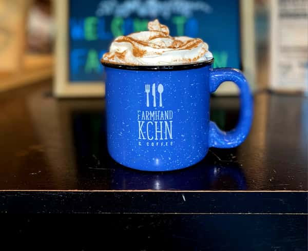 Farmhand enamel mug with whipped cream coffee