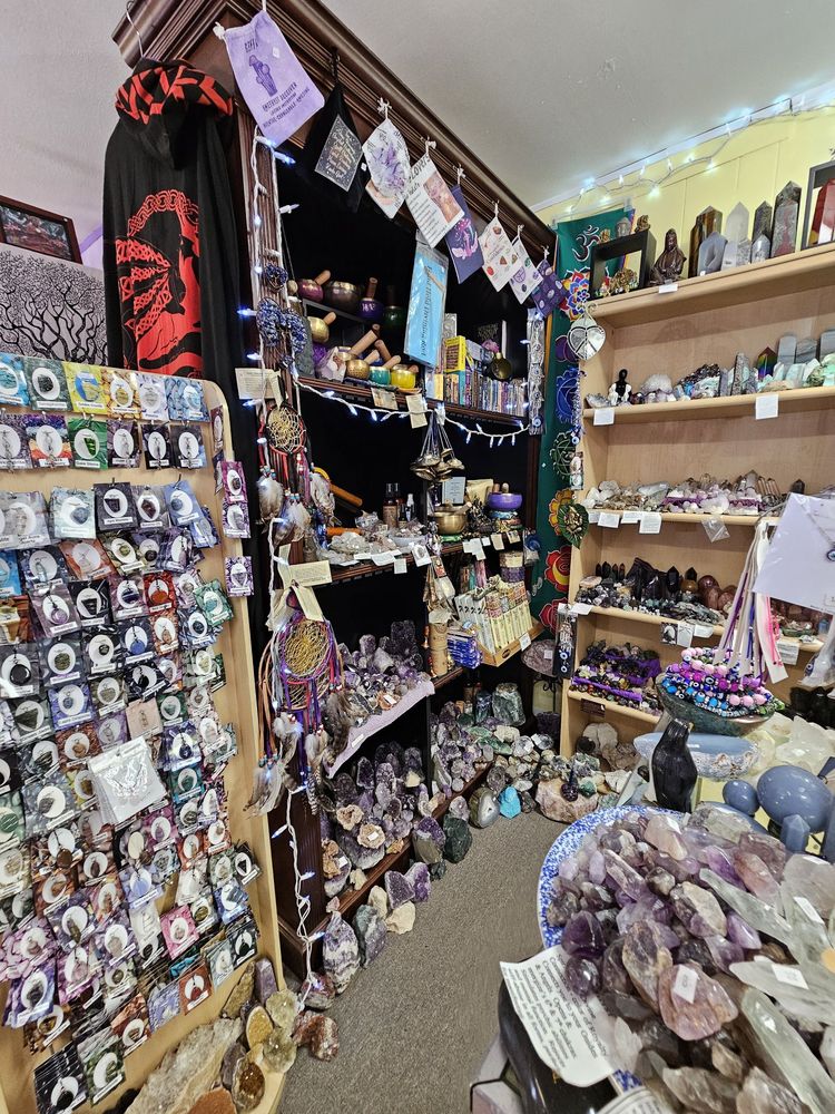 Crystals, singing bowls, and dreamcatchers on our hutch
