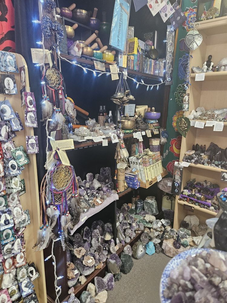 Singing bowls, amethyst, and dreamcatchers on our shelves