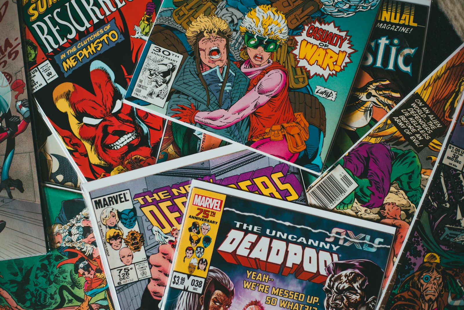 A pile of comics in protective sleeves.