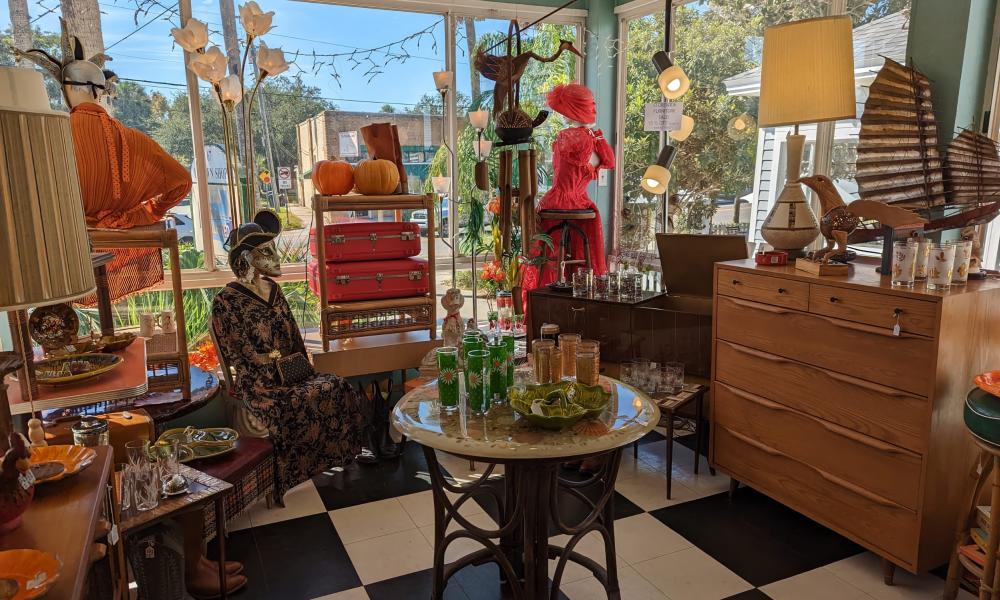 Furniture, glass, and clothing in our front room.