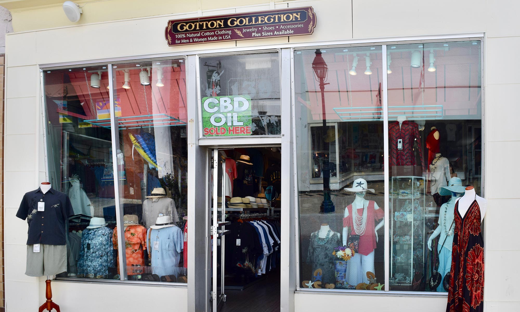 Our storefront on Saint George Street, gold-bordered Cotton Collection sign above the windows