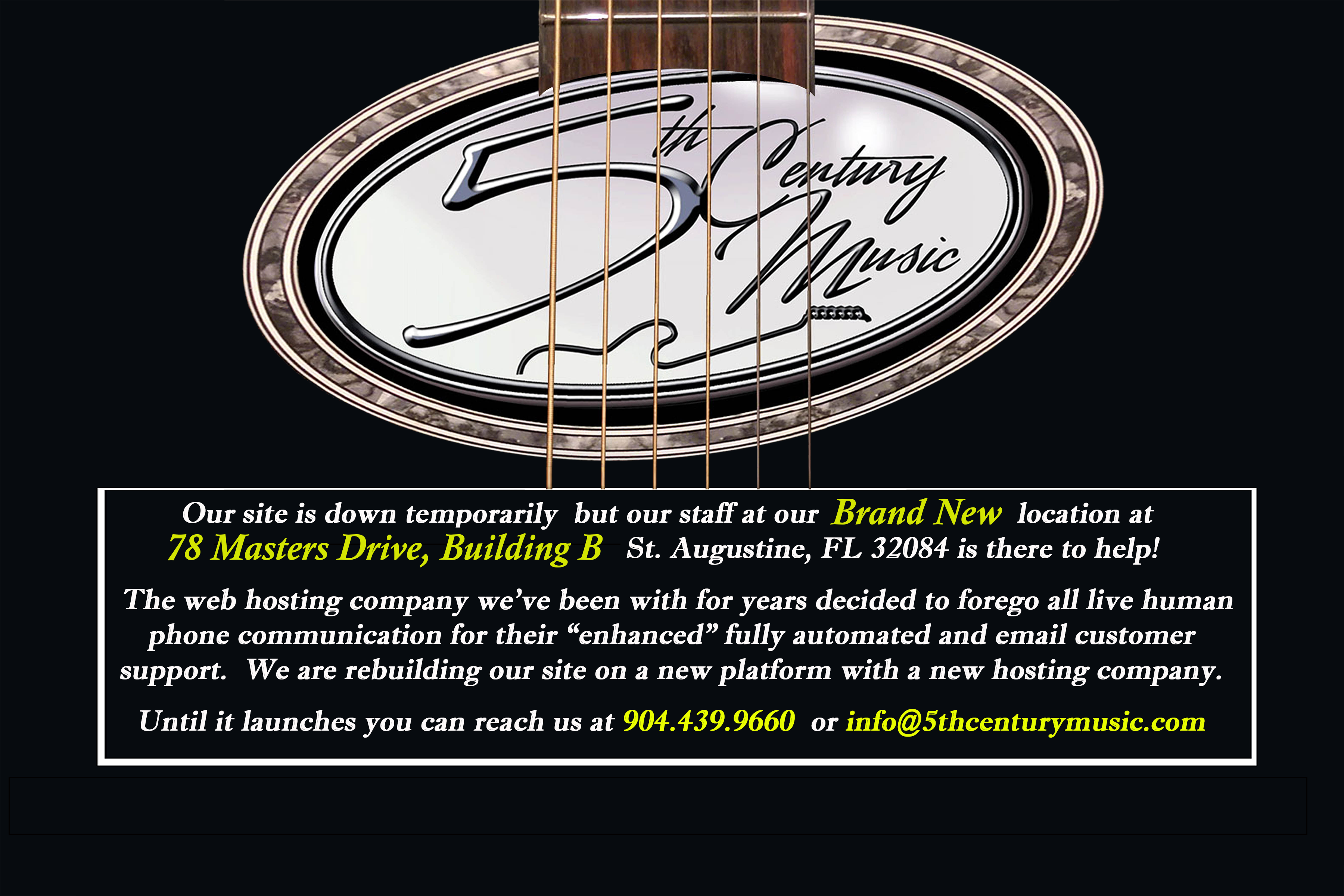 Our shop sign with the soundhole mark.