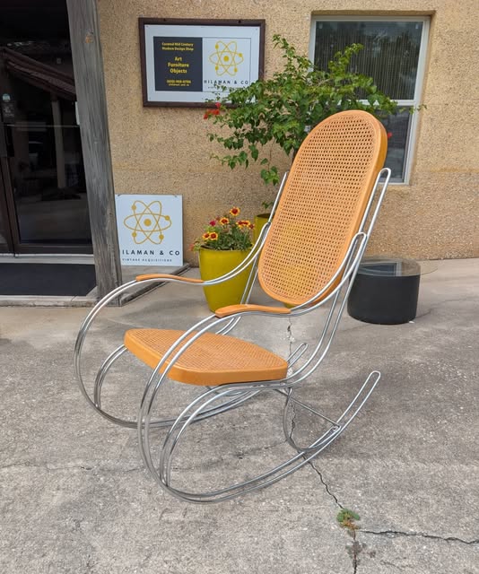 Our cane rocker and atomic sign outside Unit B on Rohde Ave.