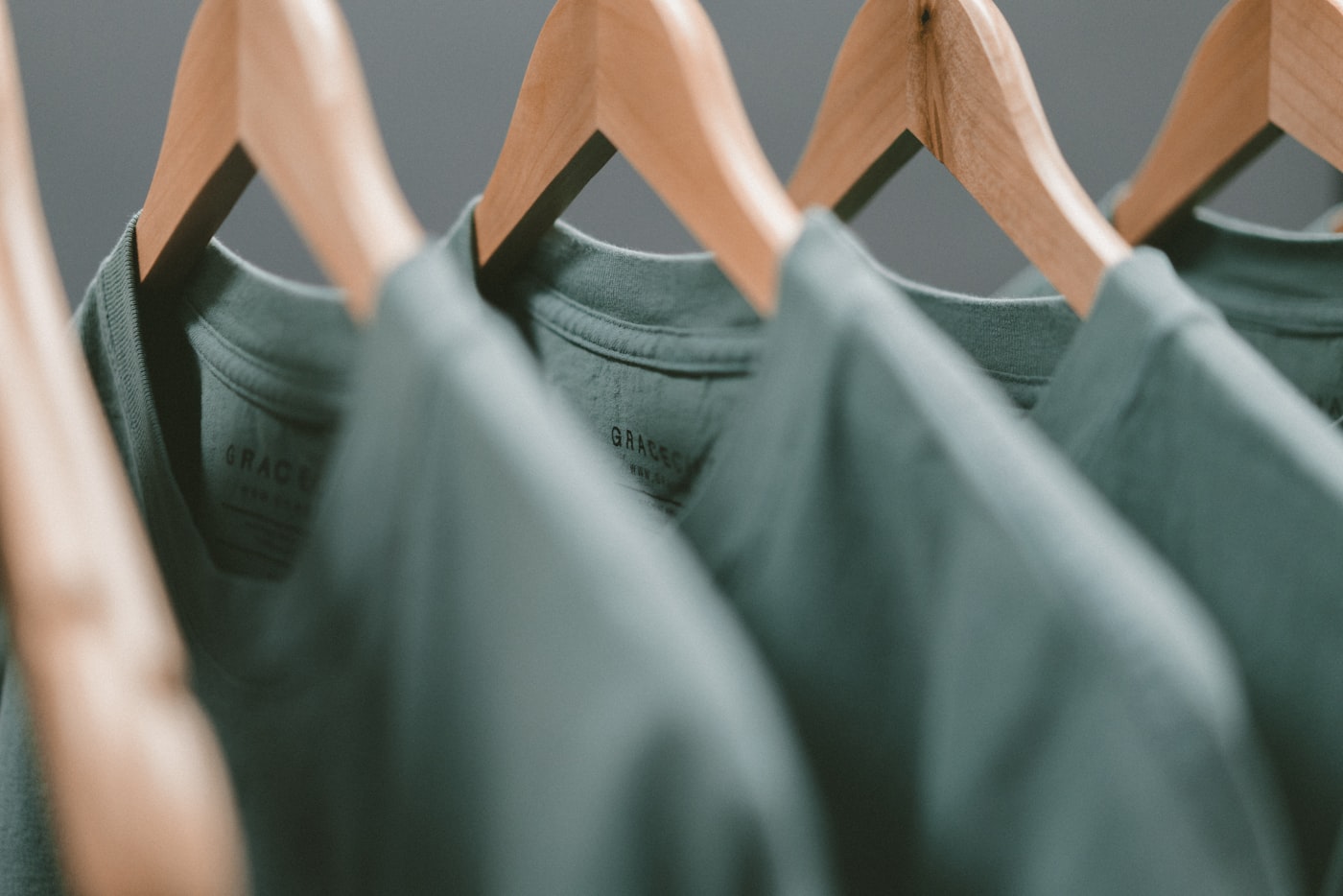 Folded shirts stacked the way we keep extras behind the rail.