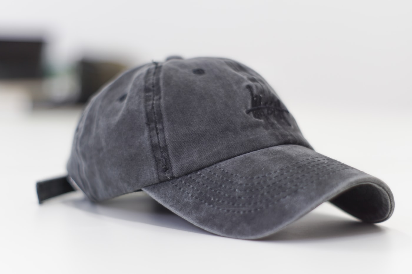 A washed cotton cap of the kind we keep on the top shelf.