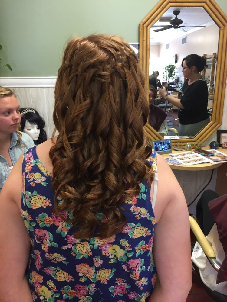 A braid and curl finish from our chair.