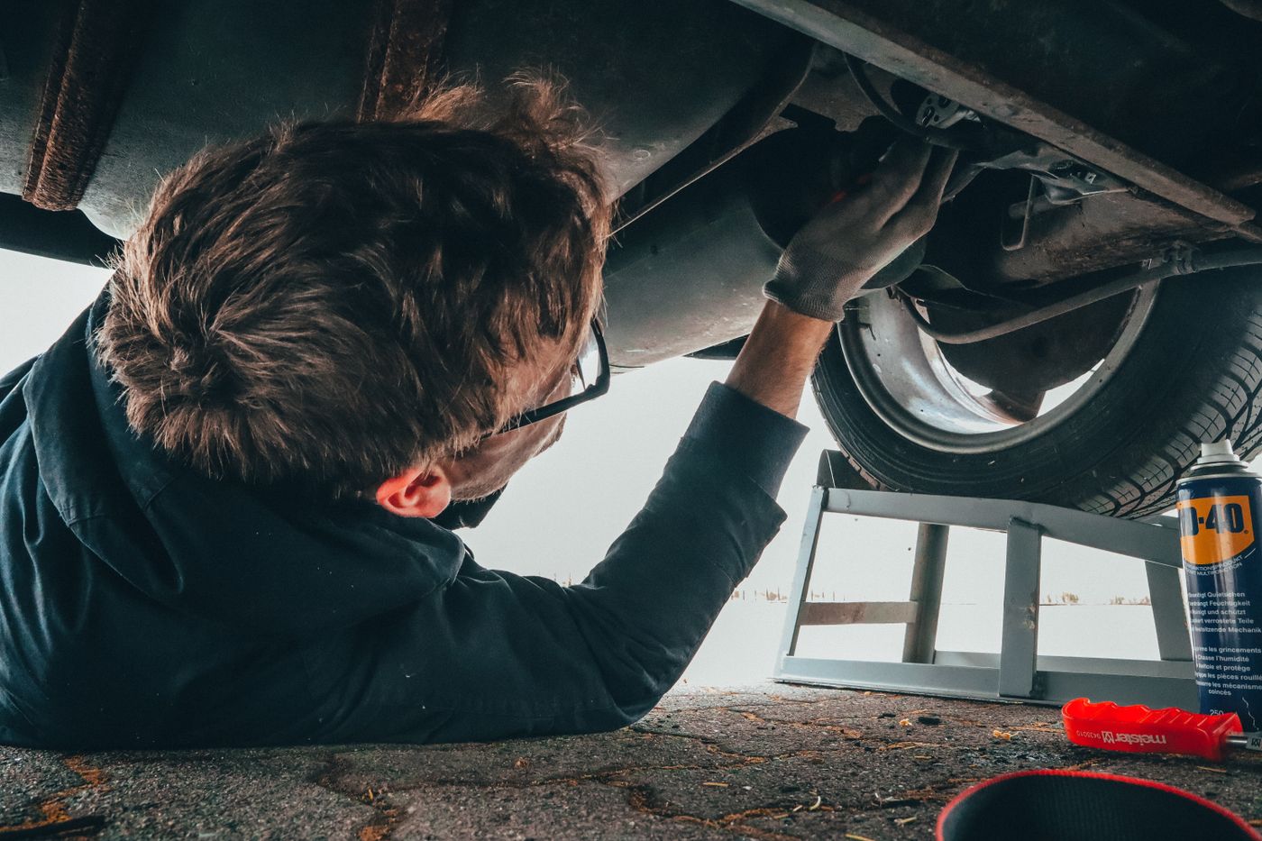 Hands on a wrench in the bay.